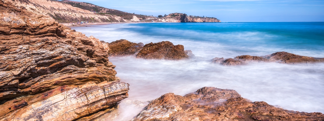 Long exposure view of Crystal Cove State Park Beach in California