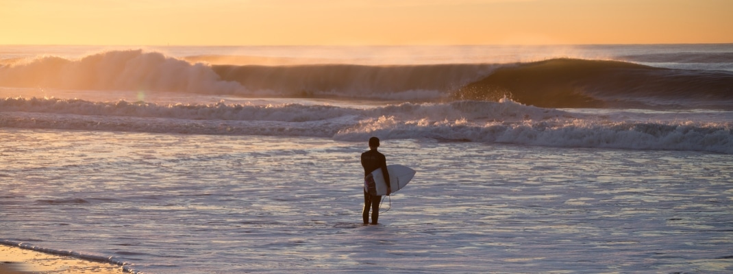 Surfer in the water on the West Coast USA