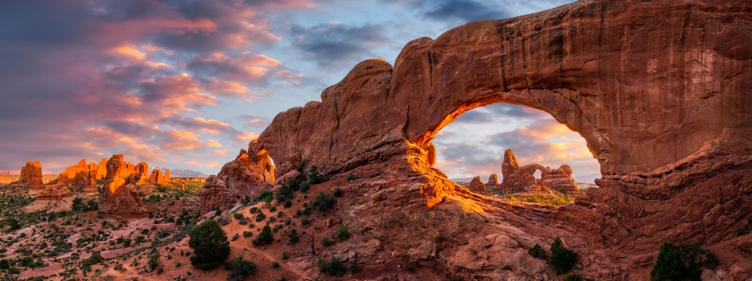 Evening light over North Window with Turret Arch