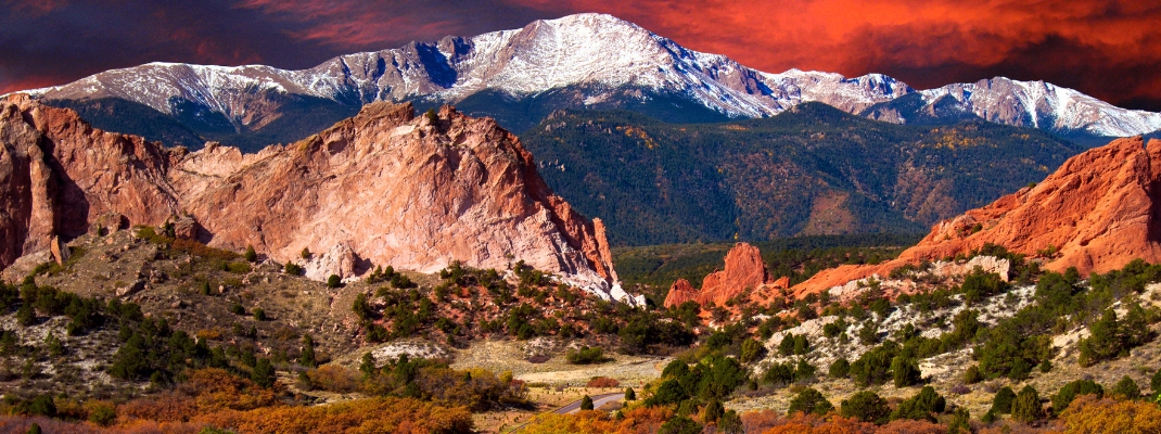 Pikes Peak Soaring over the Garden of the Gods with Dramatic Sky 